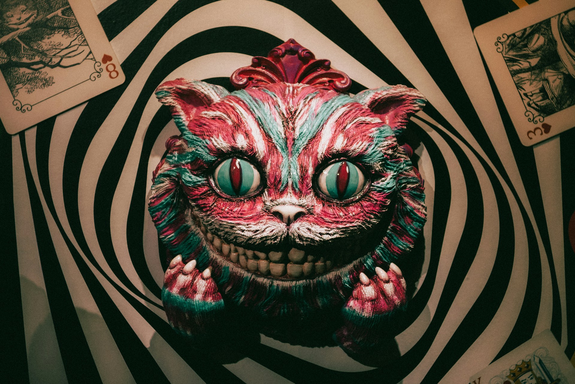Surreal grinning cat against a hypnotic spiral, illustrating a brand hallucination in AI responses